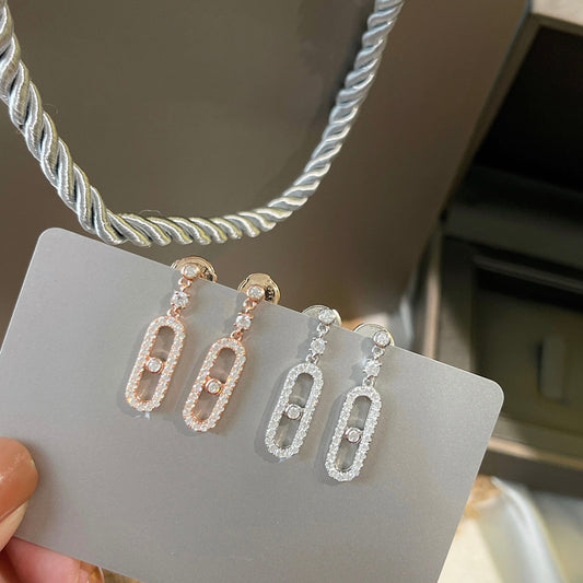 Original fashionable 925 sterling silver woman earrings. Classic Symmetric Letter Zircon Christmas Jewelry